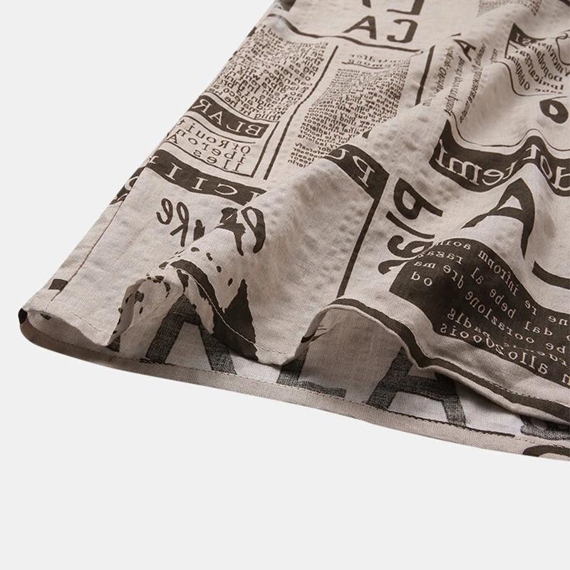 Journalist-Vanguard Statement-Shirt with High-Contrast Newsprint-Grid & Sculptural Hem