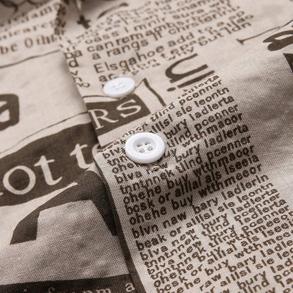 Journalist-Vanguard Statement-Shirt with High-Contrast Newsprint-Grid & Sculptural Hem