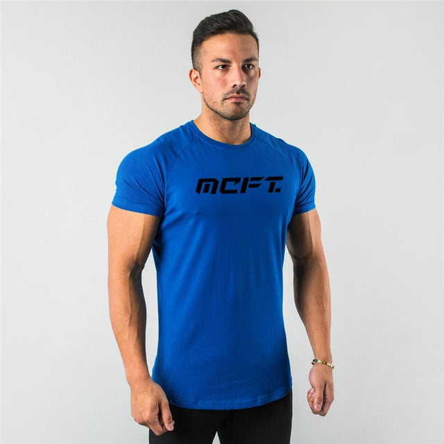 The Vanguard-Core Muscle-Fit Tee with Architectural Curved-Hem & Kinetic-Sleeve