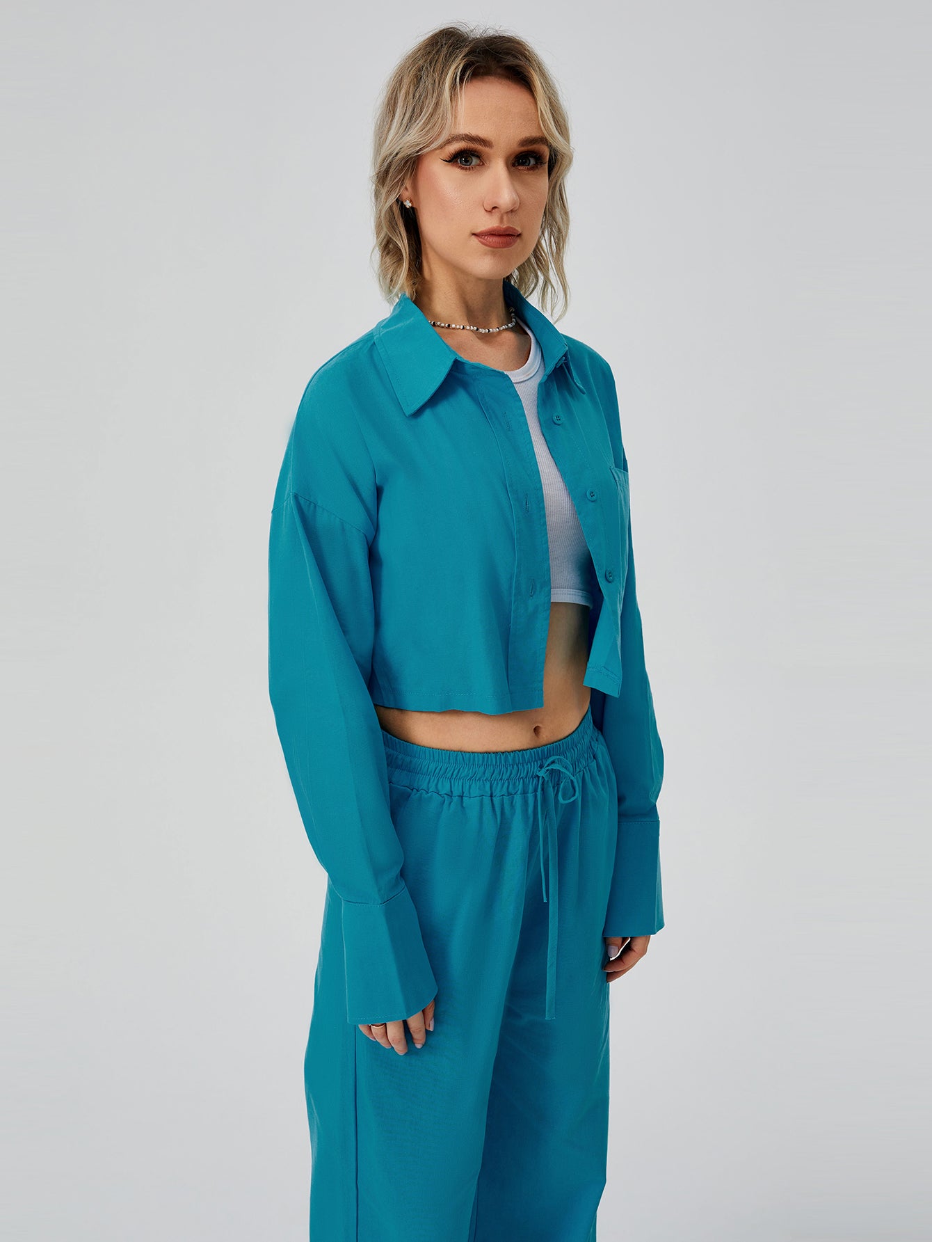 Utility-Zen Relaxed Suit with Architectural Crop-Frame & Fluid Draping