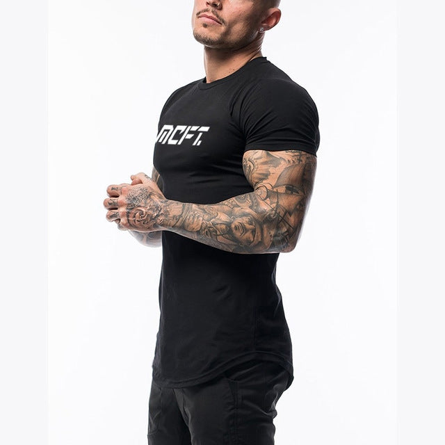 The Vanguard-Core Muscle-Fit Tee with Architectural Curved-Hem & Kinetic-Sleeve