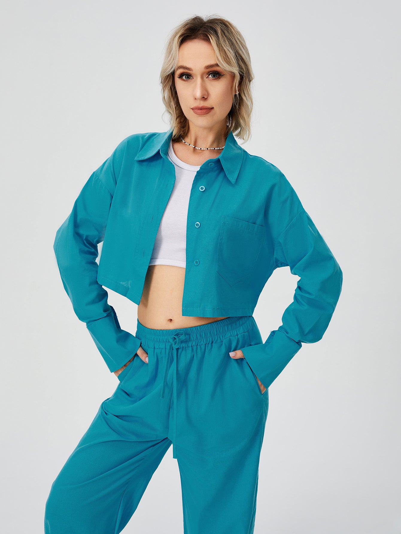Utility-Zen Relaxed Suit with Architectural Crop-Frame & Fluid Draping
