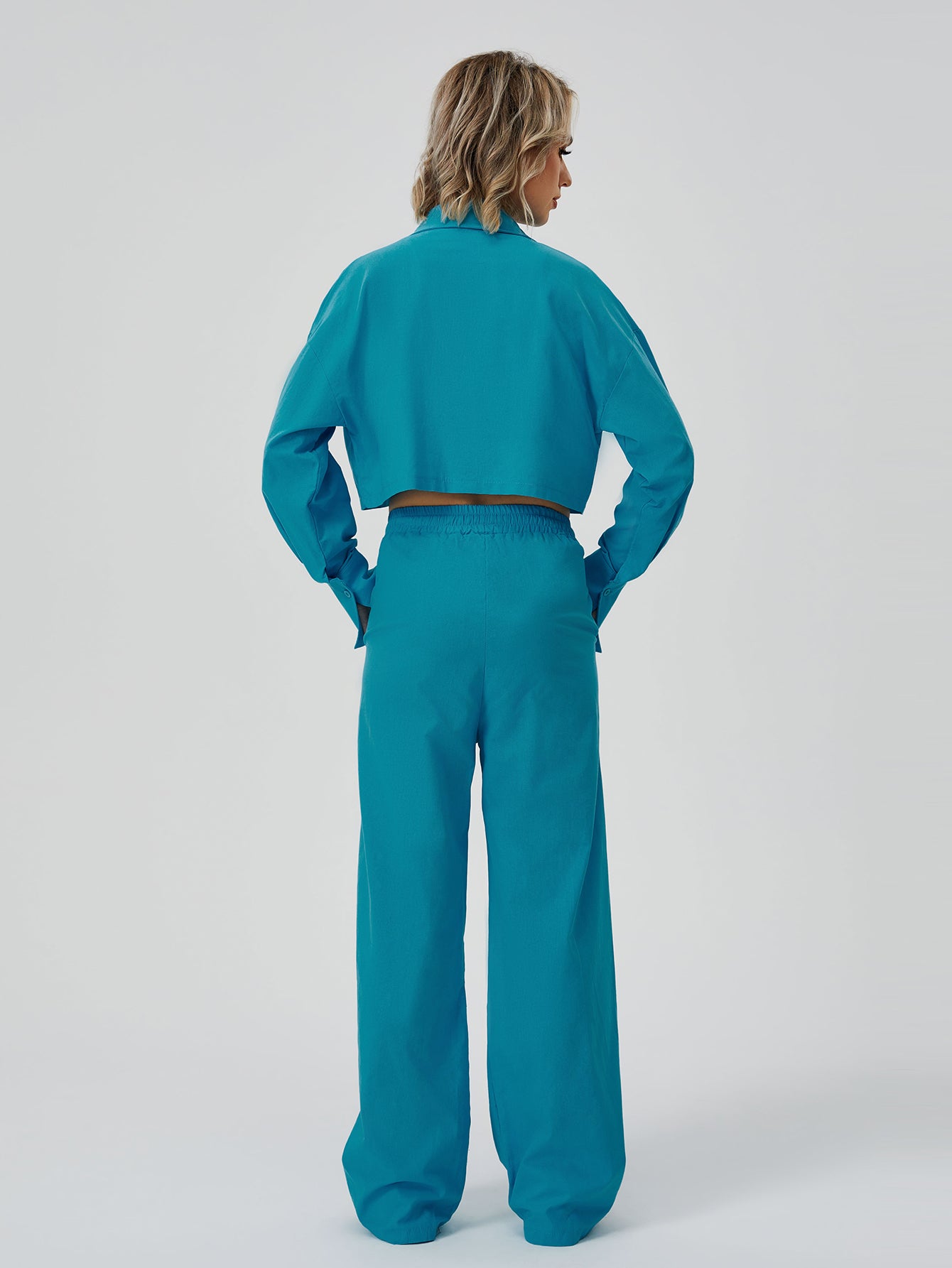 Utility-Zen Relaxed Suit with Architectural Crop-Frame & Fluid Draping