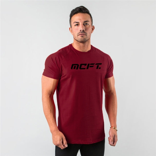 The Vanguard-Core Muscle-Fit Tee with Architectural Curved-Hem & Kinetic-Sleeve