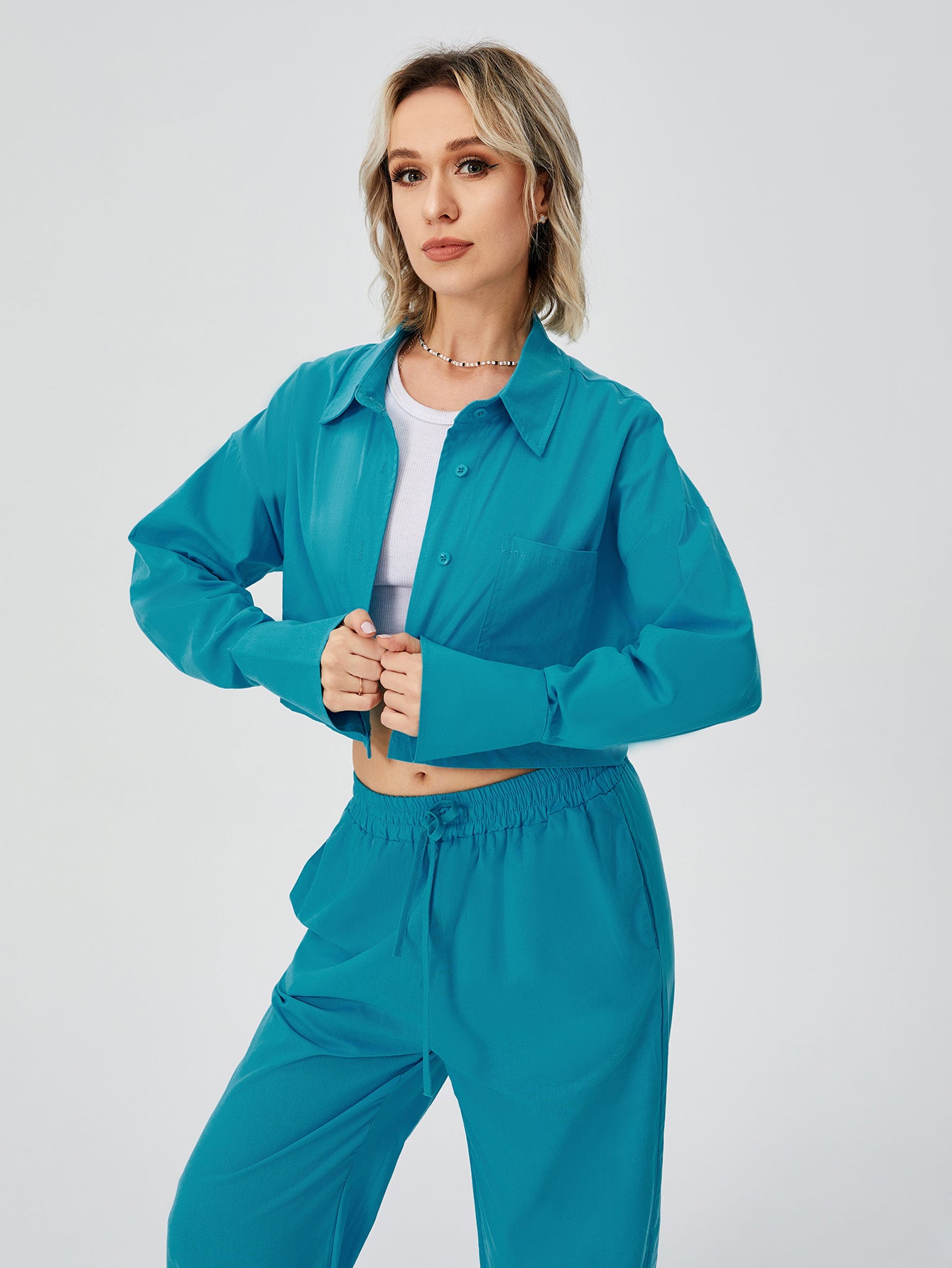 Utility-Zen Relaxed Suit with Architectural Crop-Frame & Fluid Draping